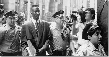 UNITED STATES - AUGUST 18:  Accused rapist Yusef Salaam is escorted by police.  (Photo by Clarence Davis/NY Daily News Archive via Getty Images)
